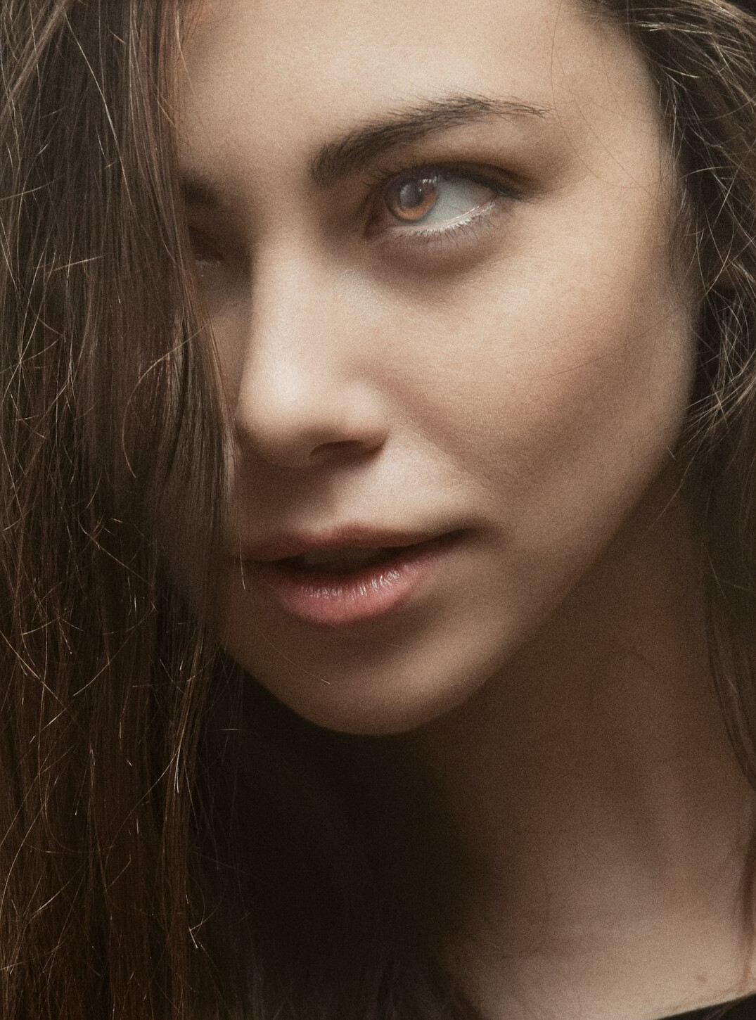 Portrait of a young woman with brown hair