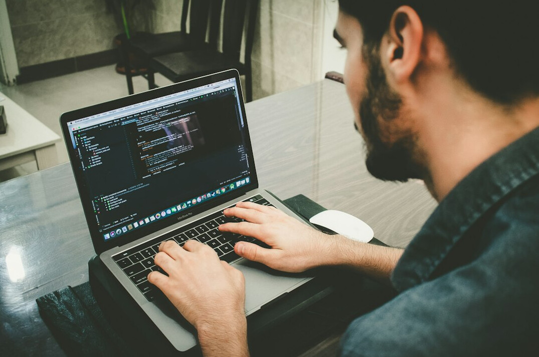 programmer working on insurance software